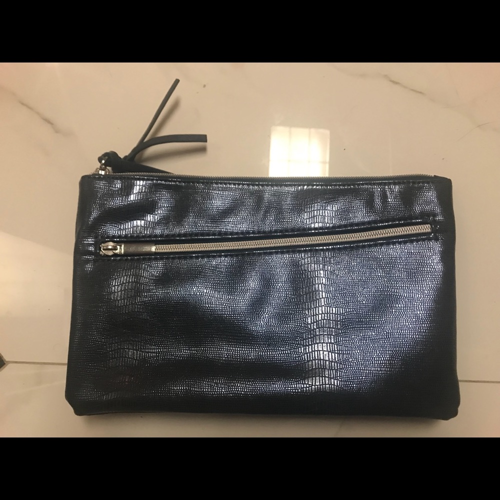 Dark blue clutch with leathery feel